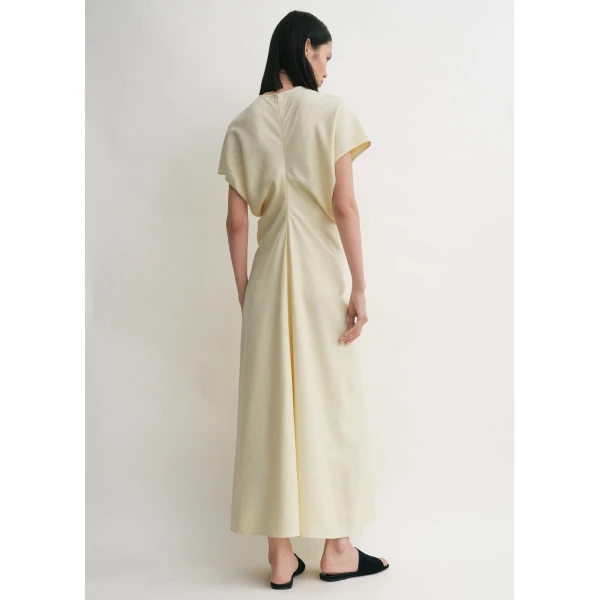 Toteme Dresses with minimalist design at Coveti