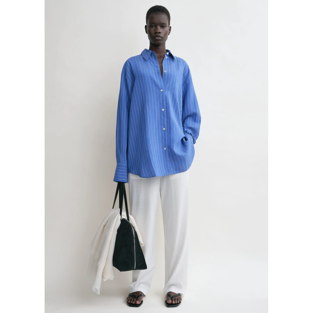 Toteme Tops with minimalist design at Coveti