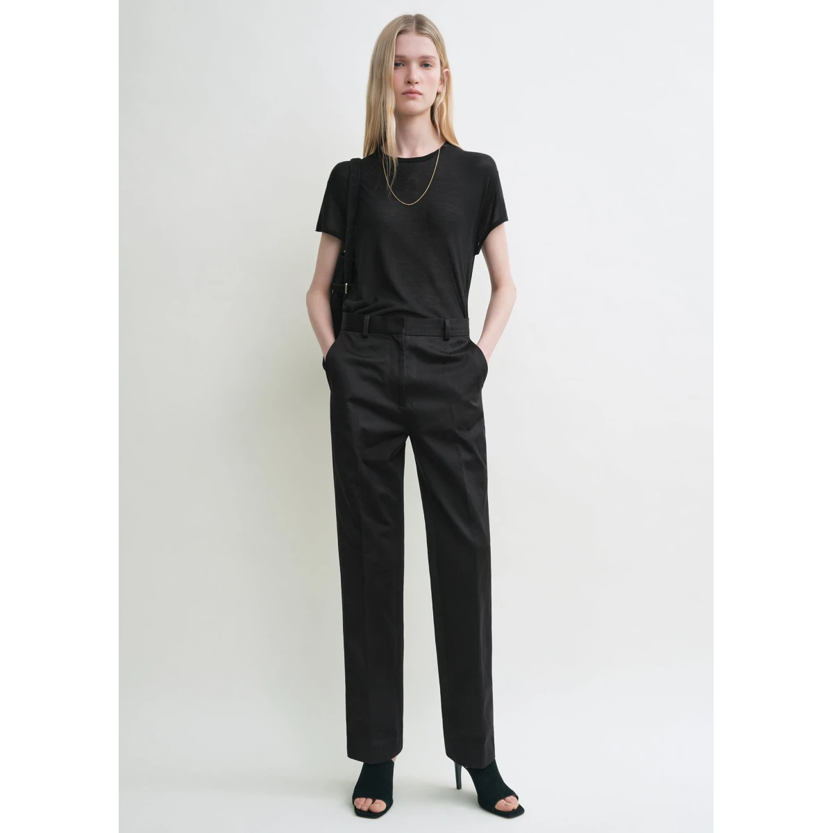Toteme Pants with minimalist design at Coveti