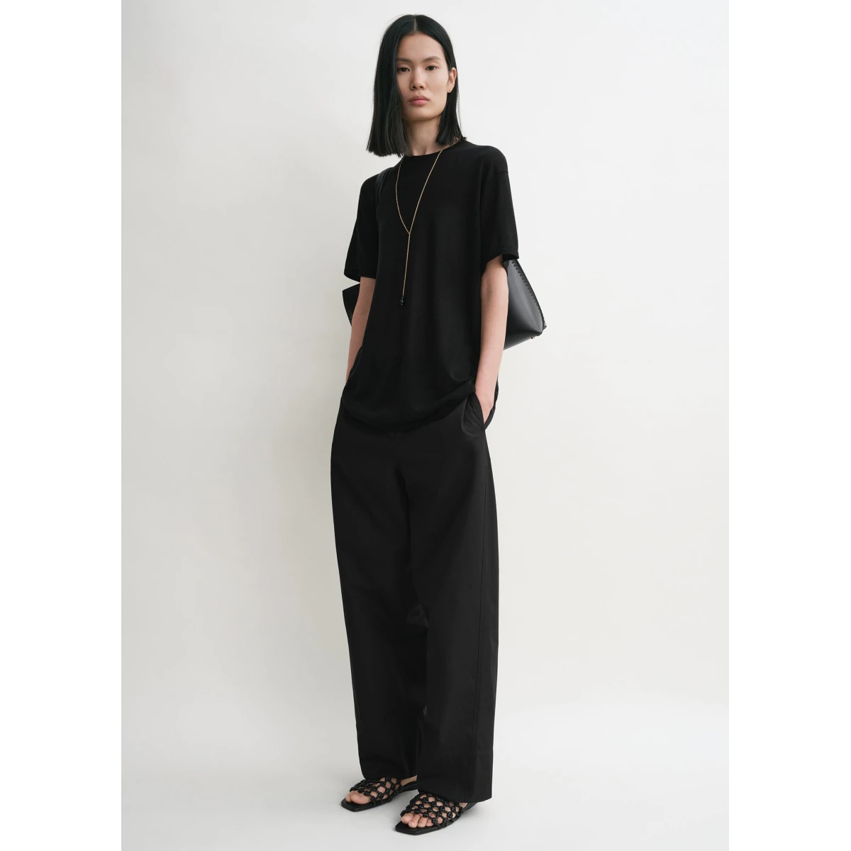 Toteme Pants with minimalist design at Coveti