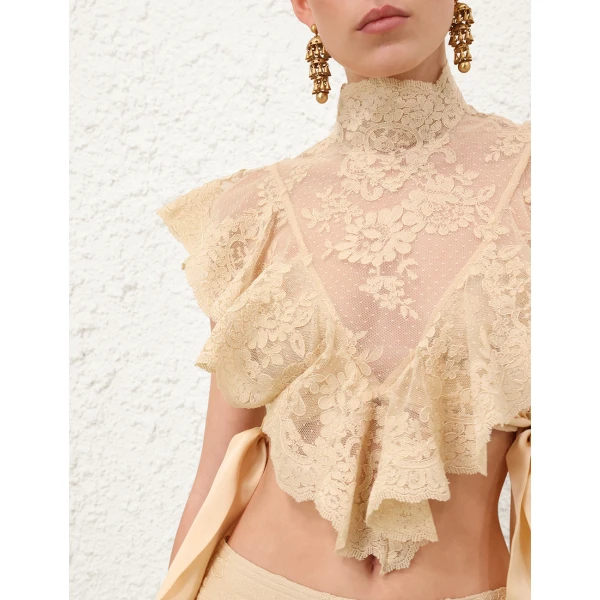 Elevate your elegance in this Zimmermann Tops   from the 2025 resort wear edit
