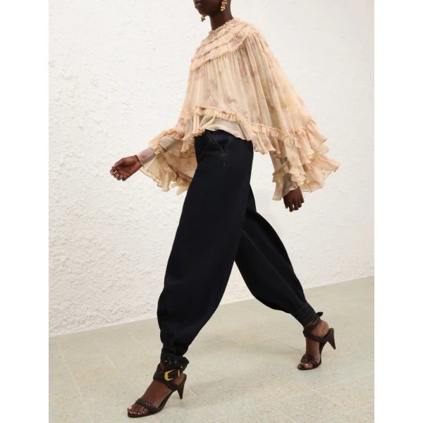 Elevate your elegance in this Zimmermann Tops   from the 2025 resort wear edit
