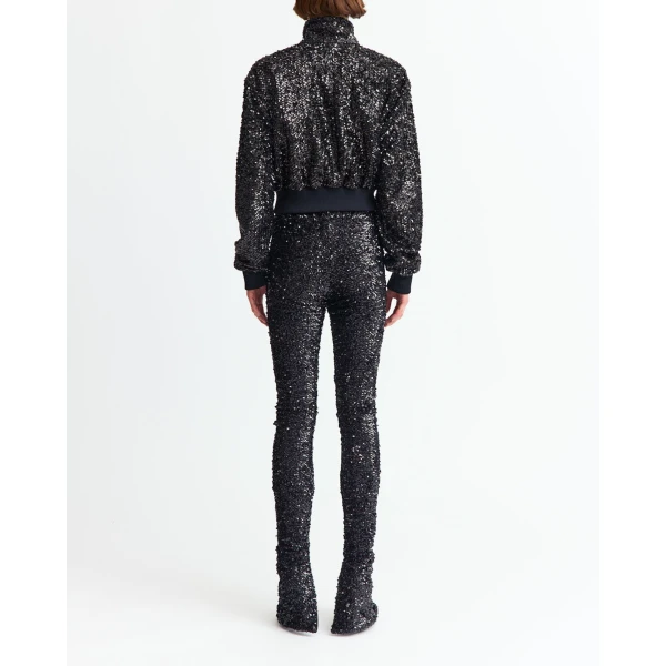 A zip at the ankle allows for a subtle flare