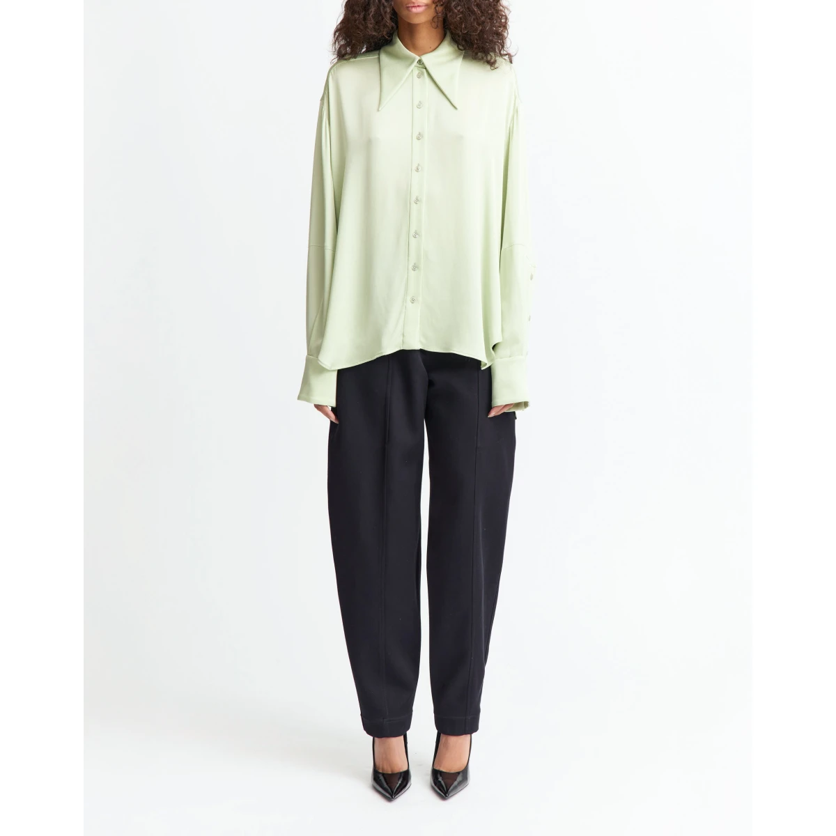 offering a gentle sheen and fluid drape.