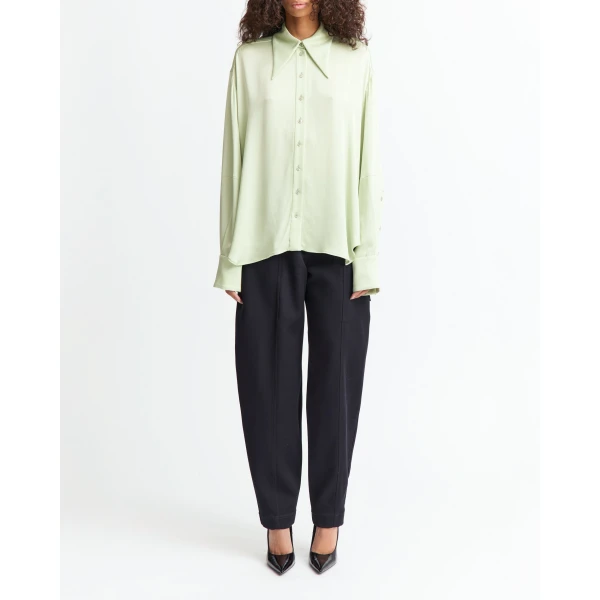 offering a gentle sheen and fluid drape.