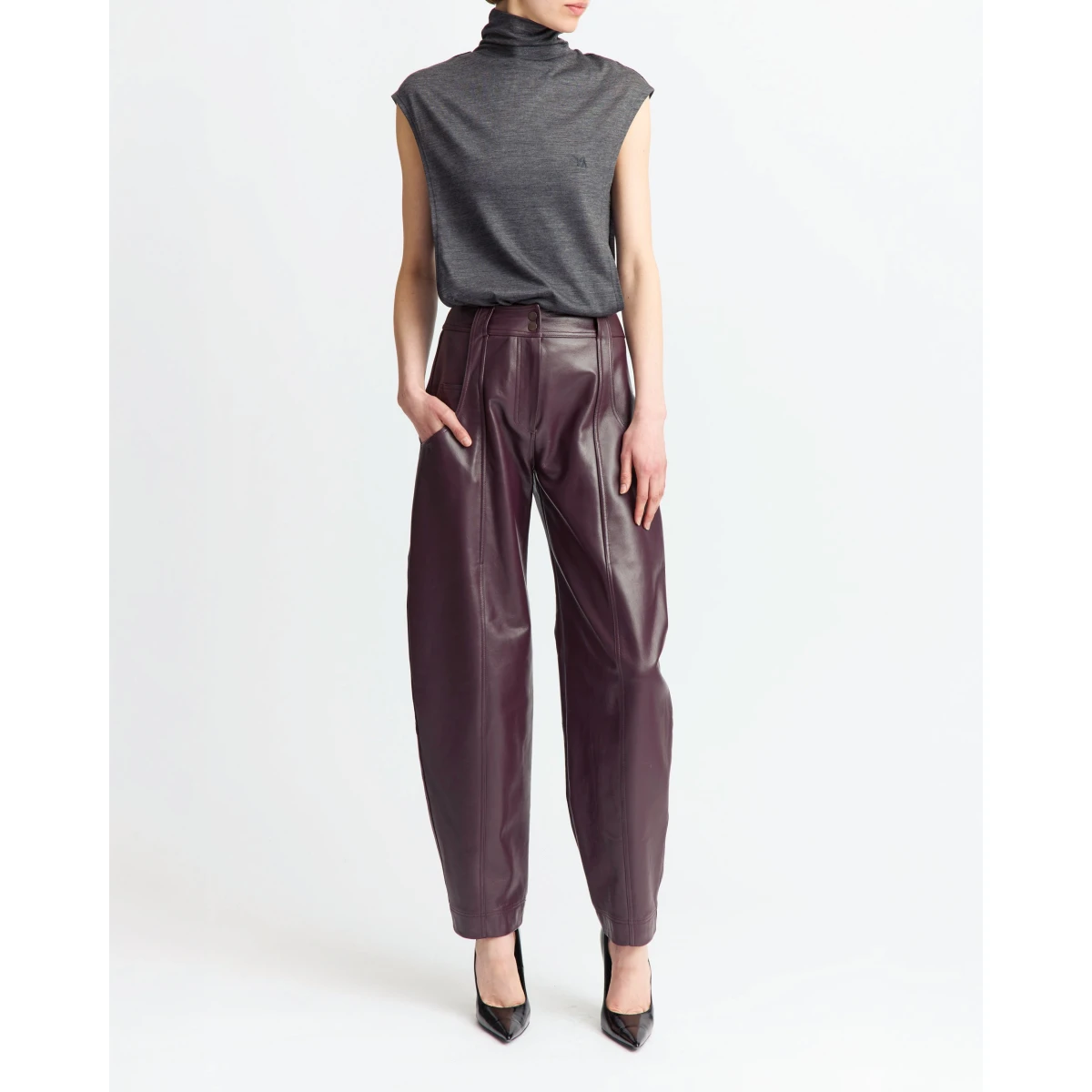 sleeveless design cut from soft wool jersey