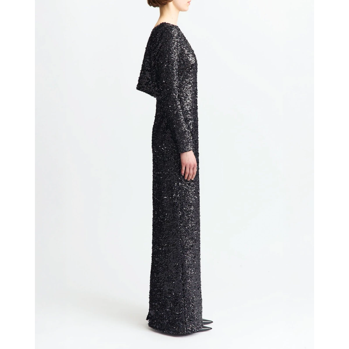 It features long sleeves and a cowl V-neck back