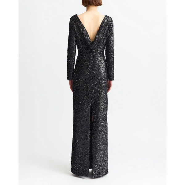 paired with a sleek split that adds ease and drama to its fitted silhouette.