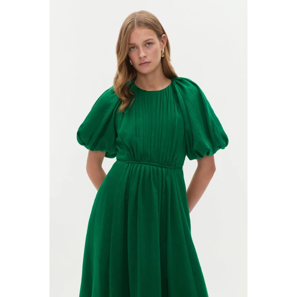 Aje Aus Dresses – structured silhouette with raw femininity from Coveti