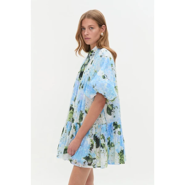 Aje Aus Dresses – structured silhouette with raw femininity from Coveti