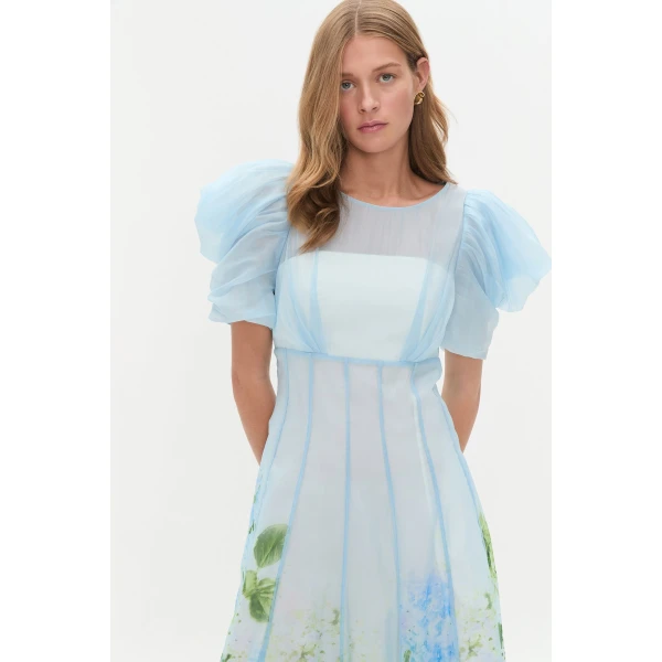Aje Aus Dresses – structured silhouette with raw femininity from Coveti