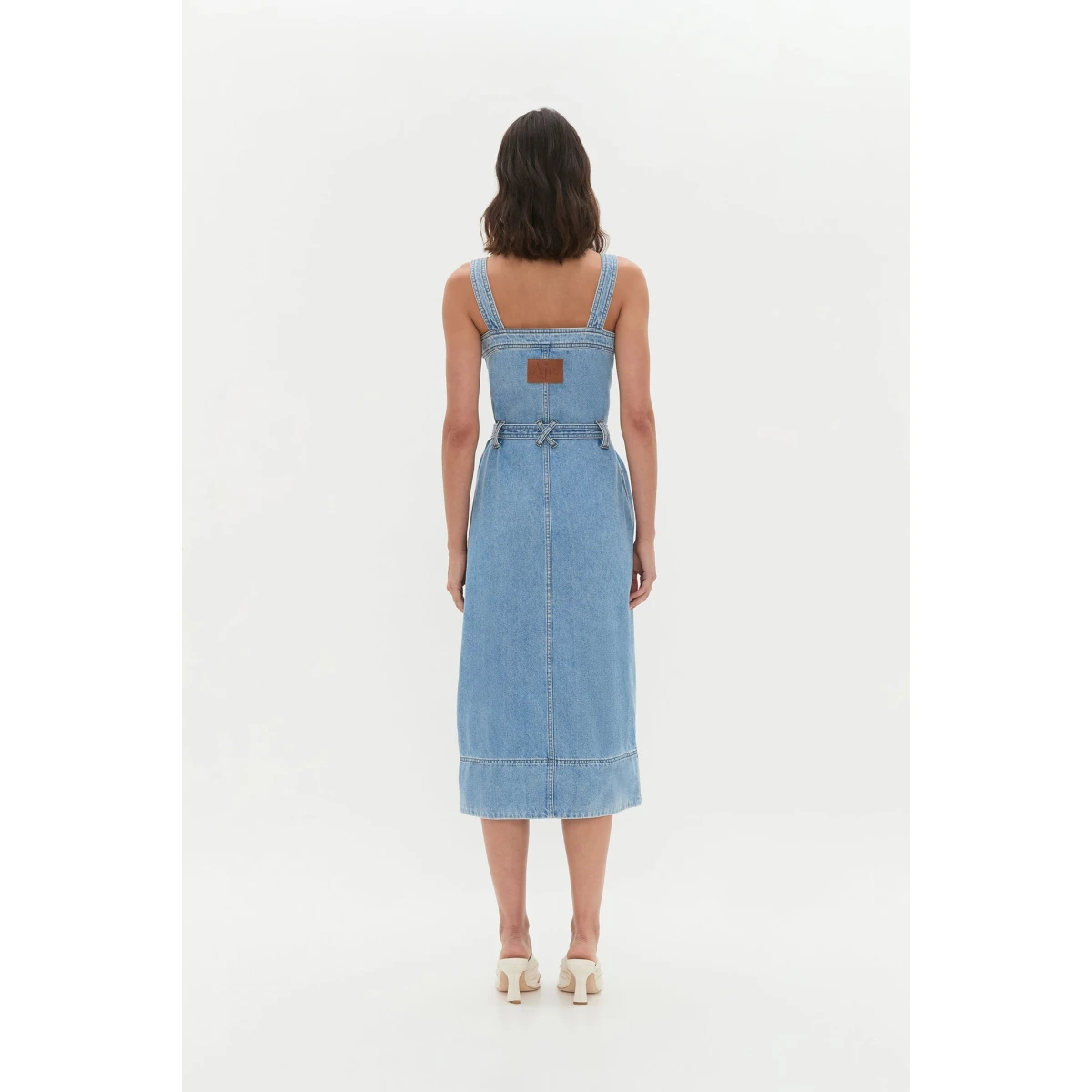 Aje Aus Dresses – structured silhouette with raw femininity from Coveti