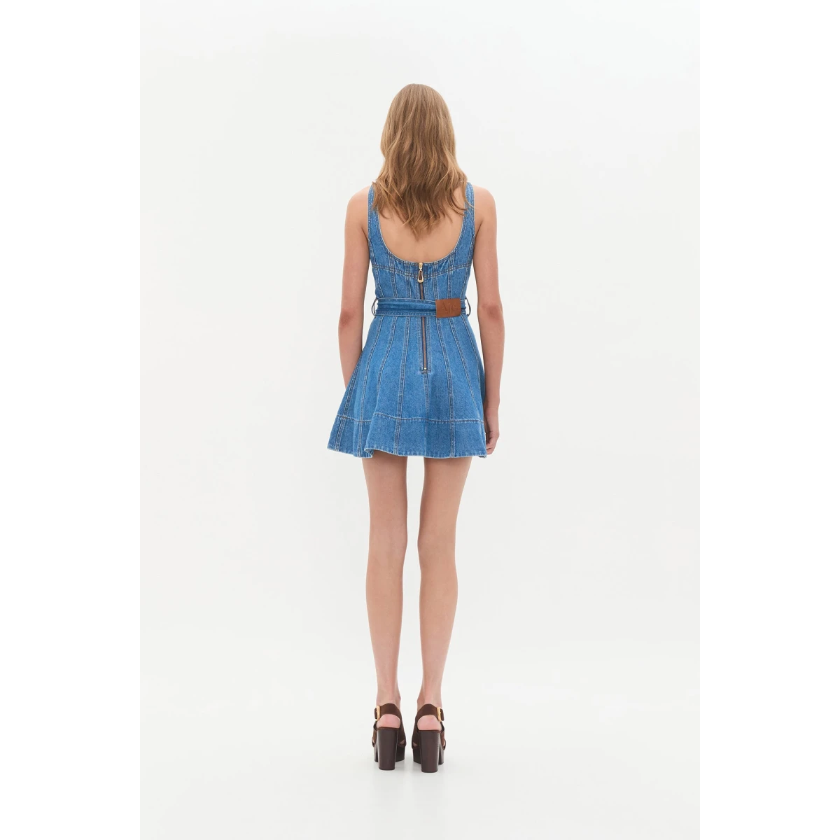 Aje Aus Dresses – structured silhouette with raw femininity from Coveti
