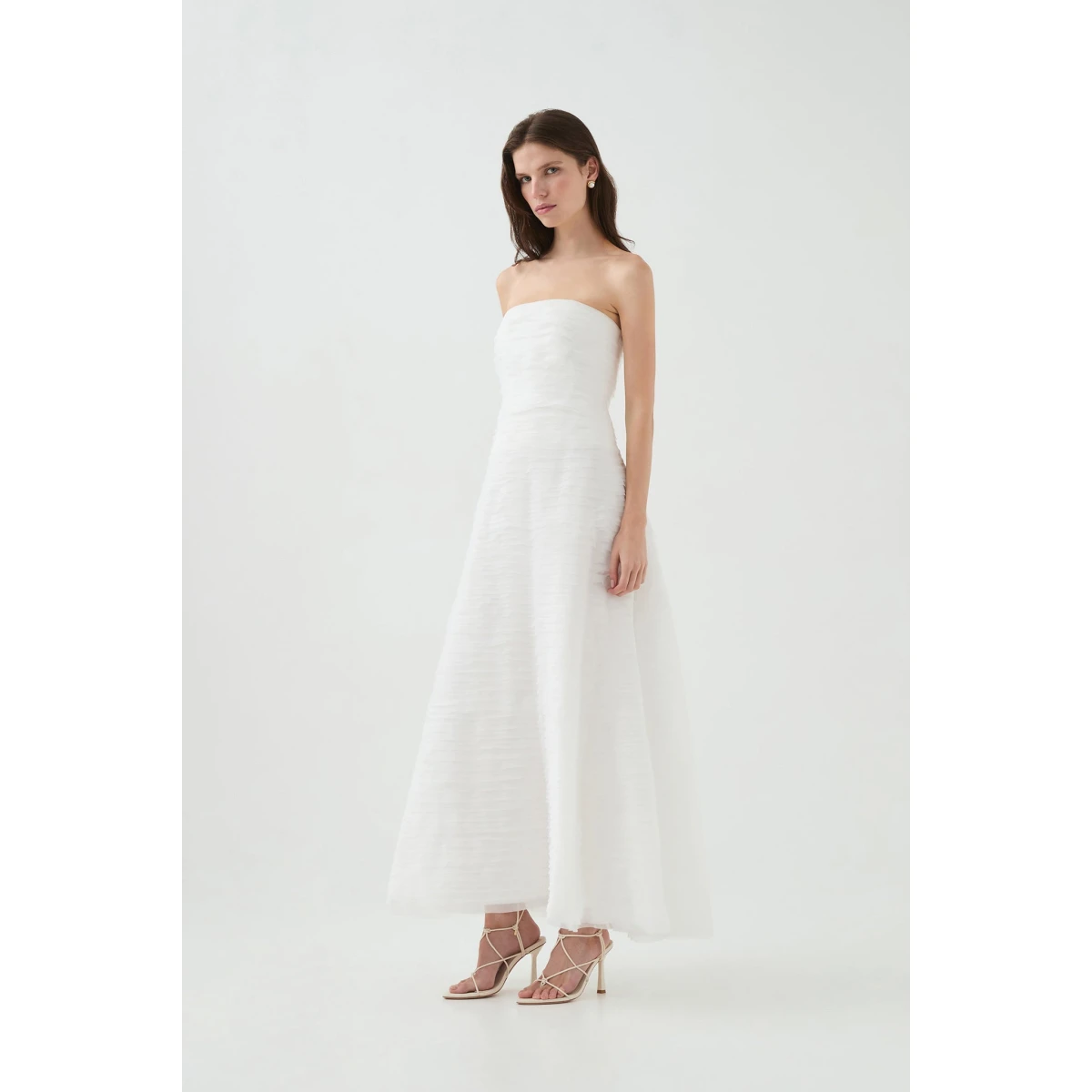 Aje Aus Dresses – structured silhouette with raw femininity from Coveti