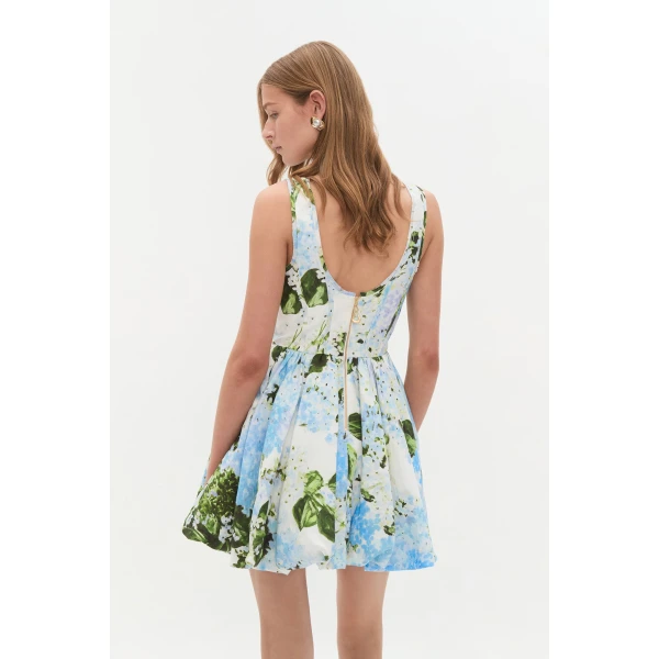 Aje Aus Dresses – structured silhouette with raw femininity from Coveti