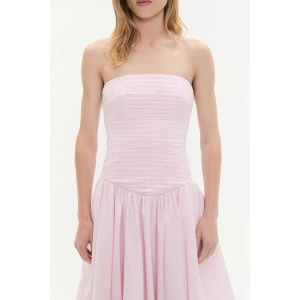 Aje Aus Dresses – structured silhouette with raw femininity from Coveti