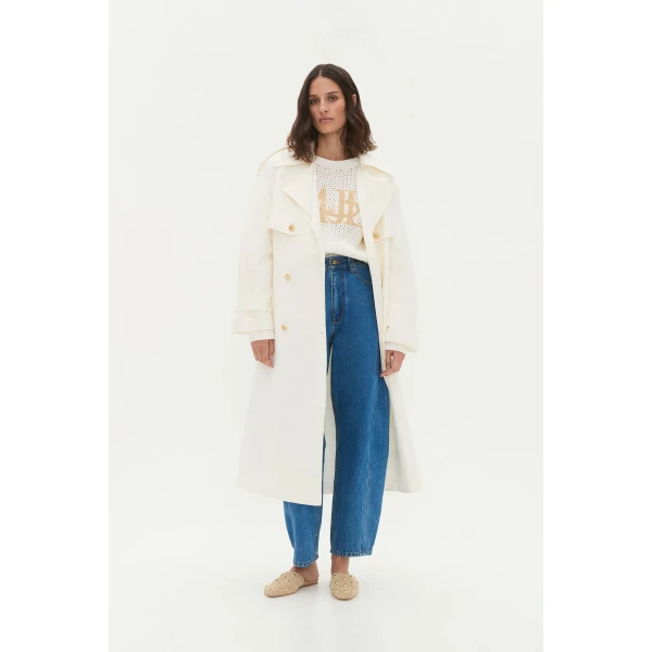 Aje clothing Aus Knitwear – structured silhouette with raw femininity from Coveti