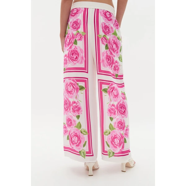 Aje clothing Aus Pants – structured silhouette with raw femininity from Coveti