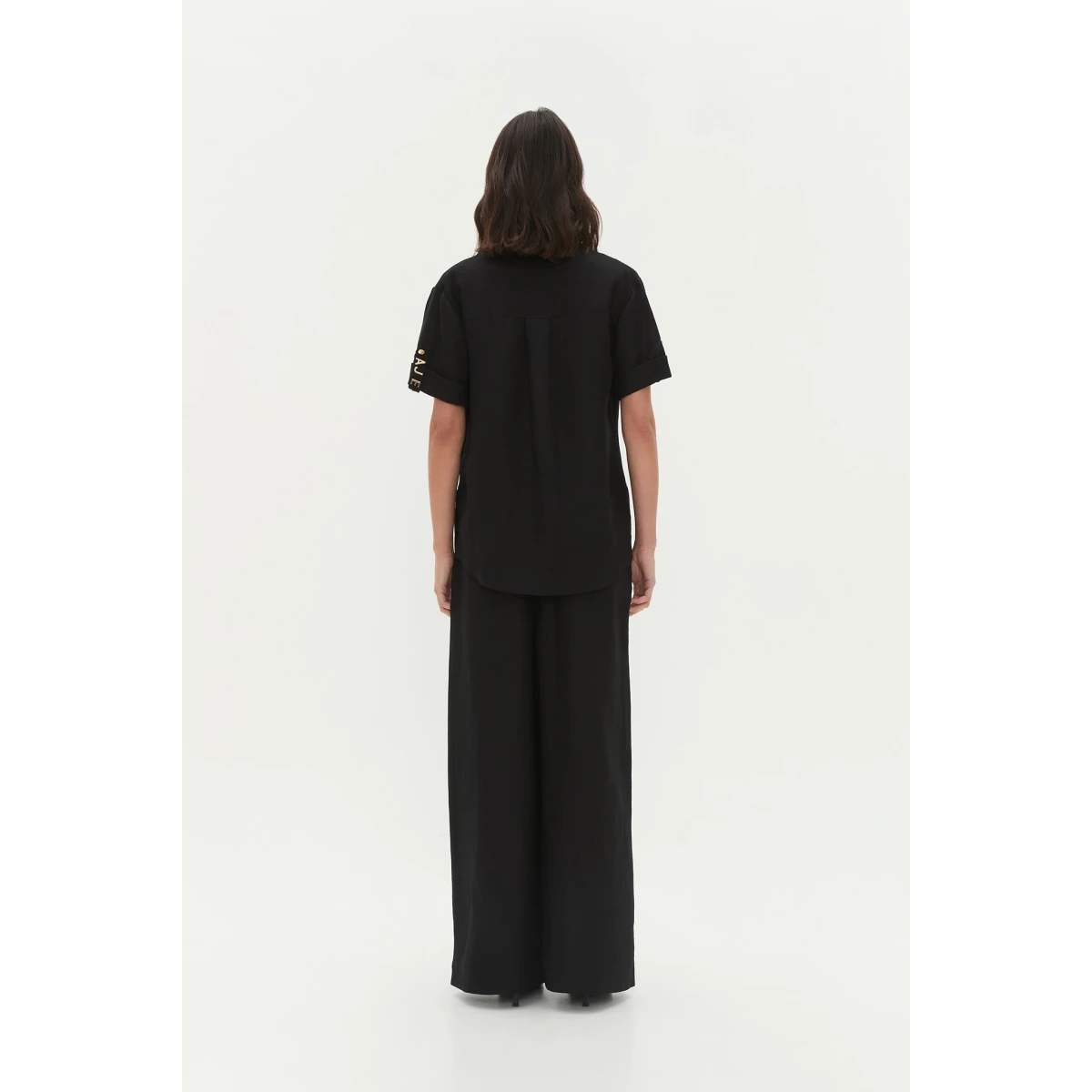 Aje Aus Pants – structured silhouette with raw femininity from Coveti