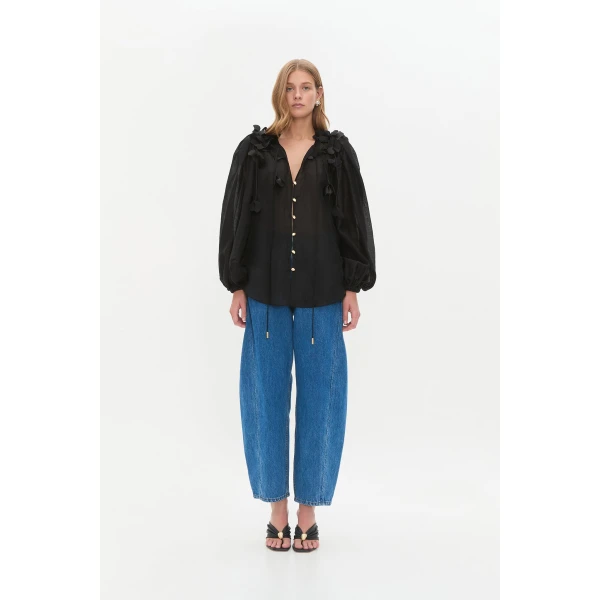 Aje Aus Tops – structured silhouette with raw femininity from Coveti