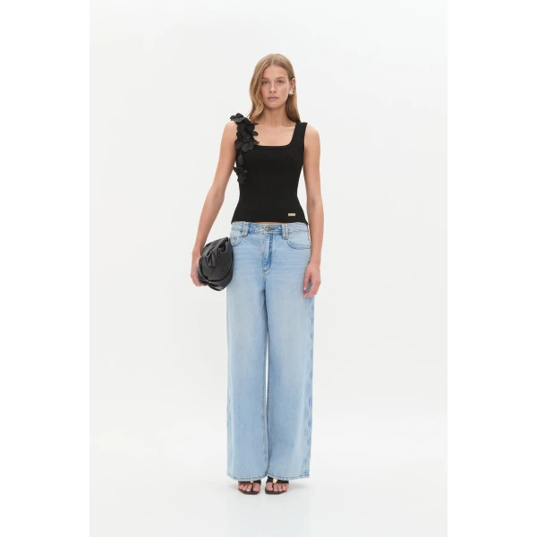 Aje clothing Aus Tops – structured silhouette with raw femininity from Coveti