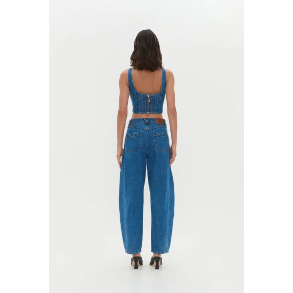 Aje Aus Tops – structured silhouette with raw femininity from Coveti