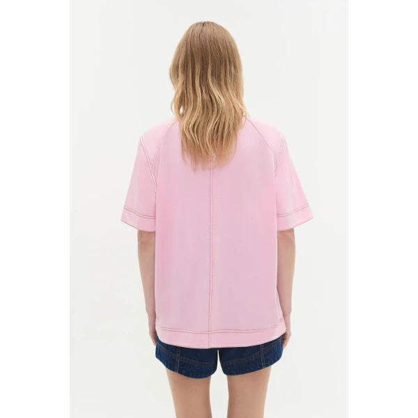 Aje Aus Tops – structured silhouette with raw femininity from Coveti