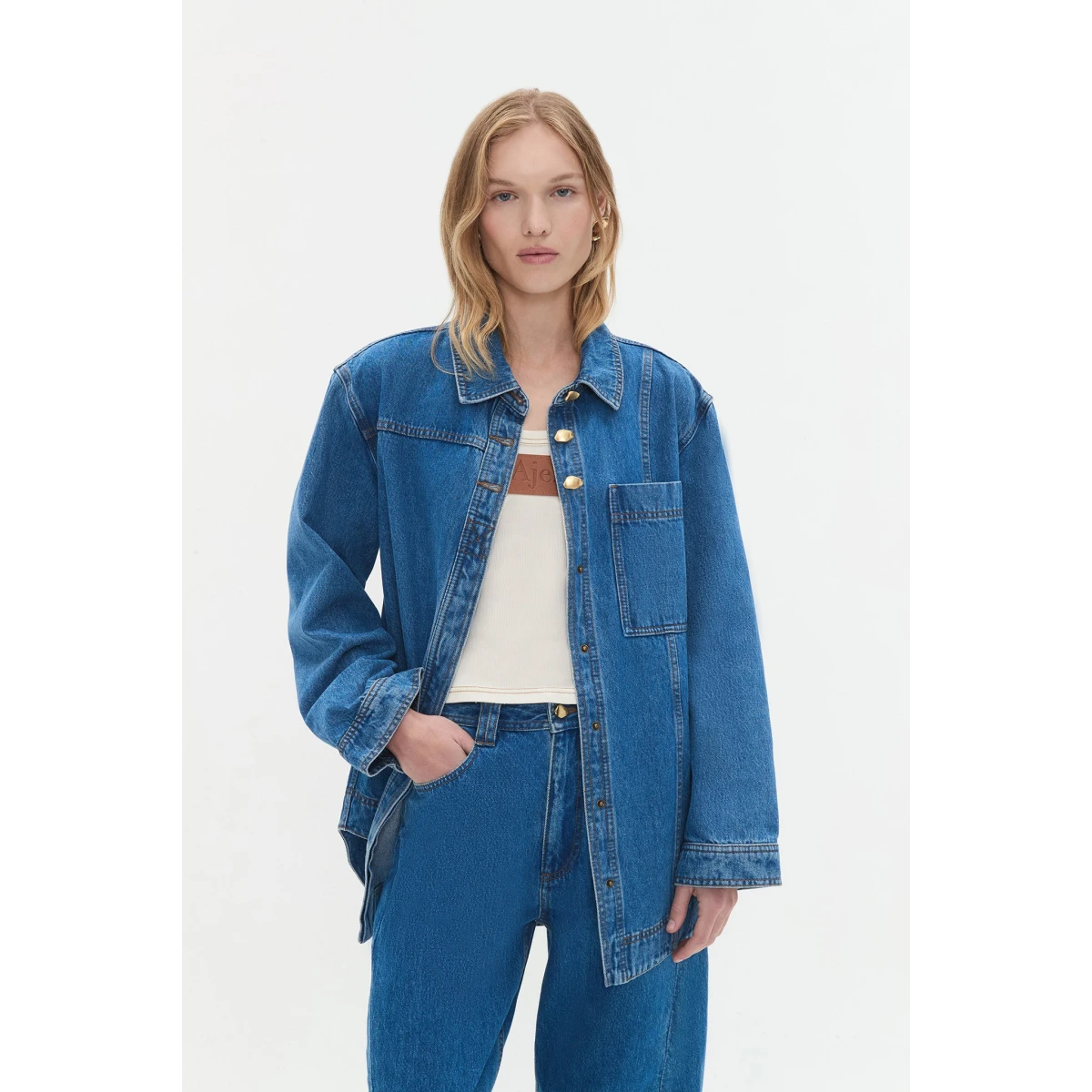 Aje Aus Tops – structured silhouette with raw femininity from Coveti