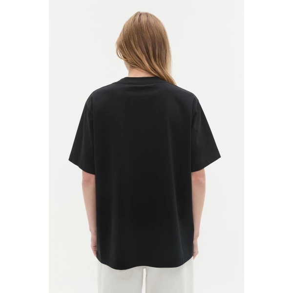Aje Aus Tops – structured silhouette with raw femininity from Coveti