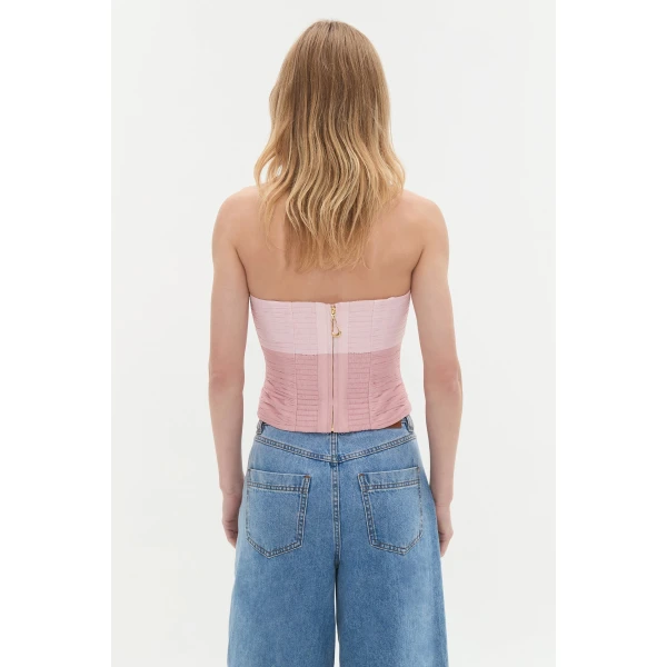 Aje Aus Tops – structured silhouette with raw femininity from Coveti