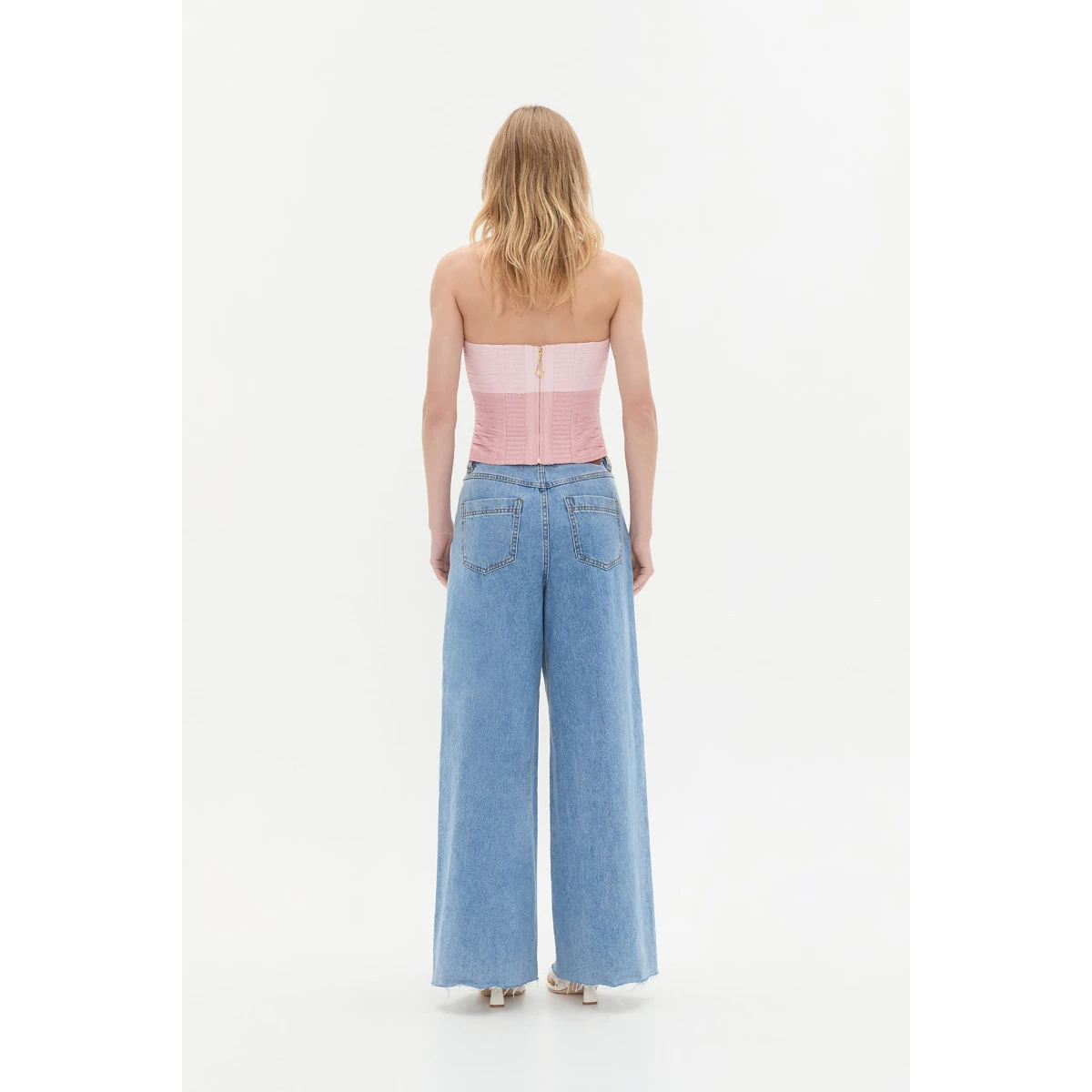 Aje clothing Aus Tops – structured silhouette with raw femininity from Coveti