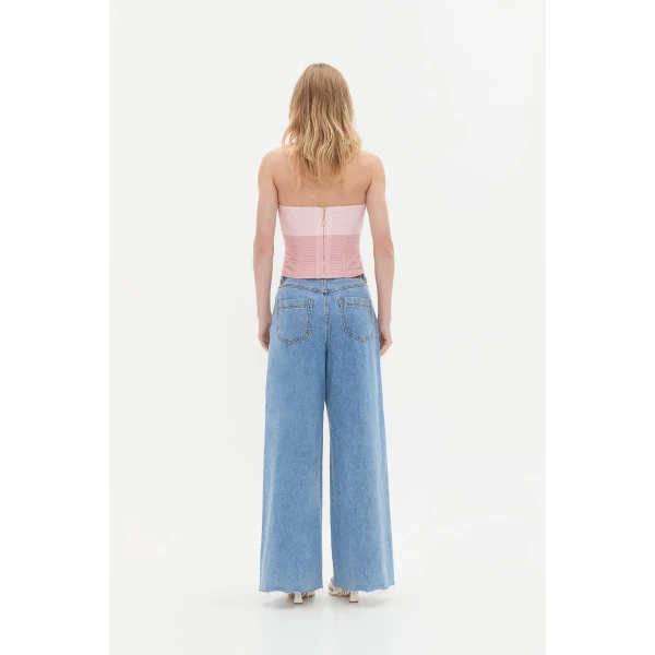 Aje clothing Aus Tops – structured silhouette with raw femininity from Coveti