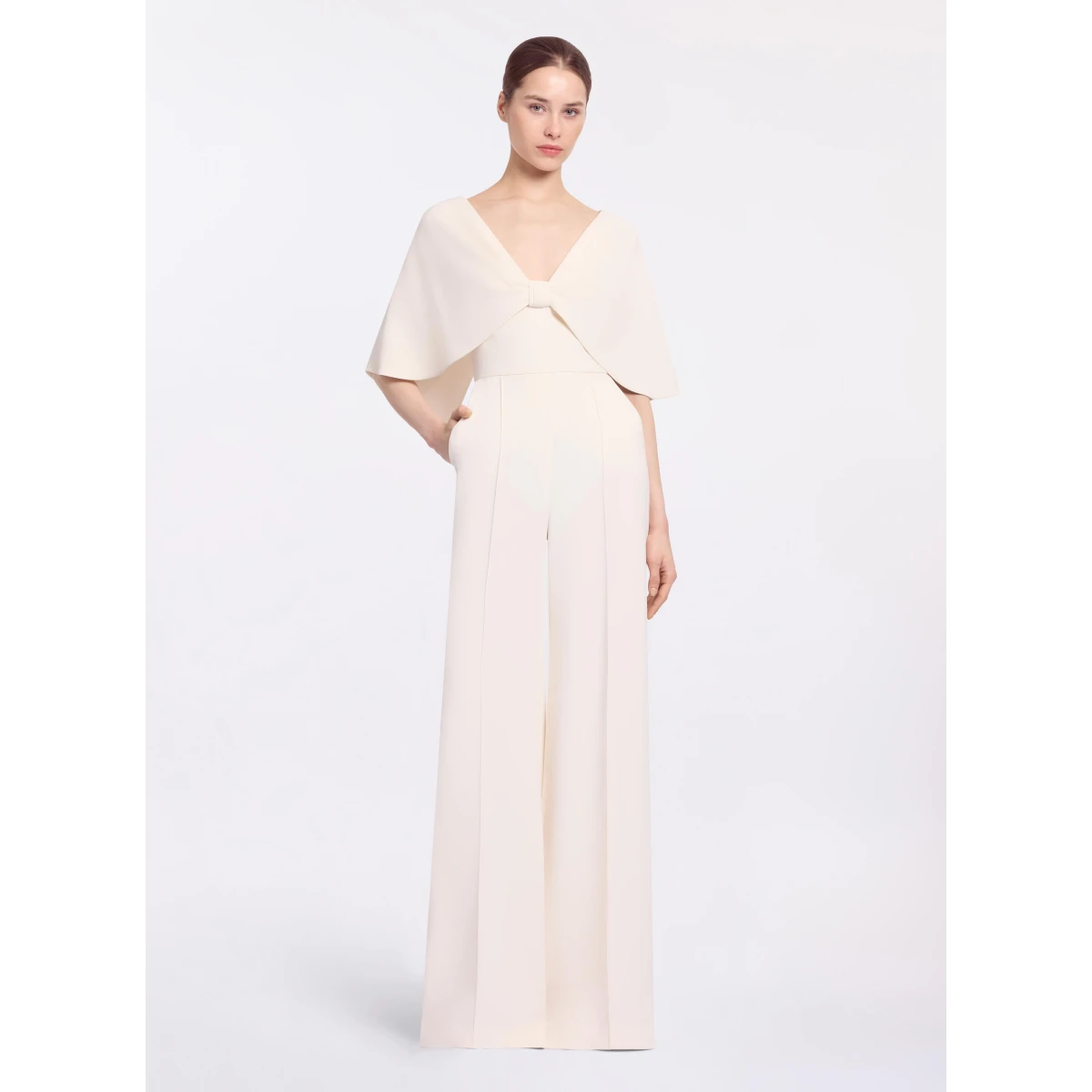 Elie Saab Cady Jumpsuit in White featuring Cape Effect Sleeves – Luxury Designer Fashion at Coveti.