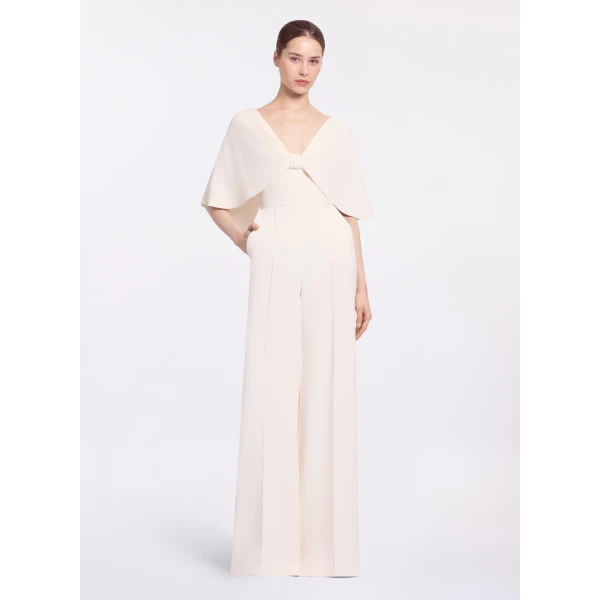 Elie Saab Cady Jumpsuit in White featuring Cape Effect Sleeves – Luxury Designer Fashion at Coveti.
