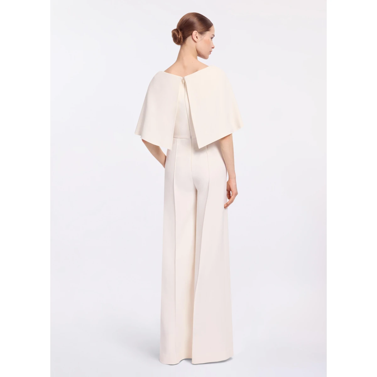 Elie Saab Cady Jumpsuit in White featuring Cape Effect Sleeves – Luxury Designer Fashion at Coveti.