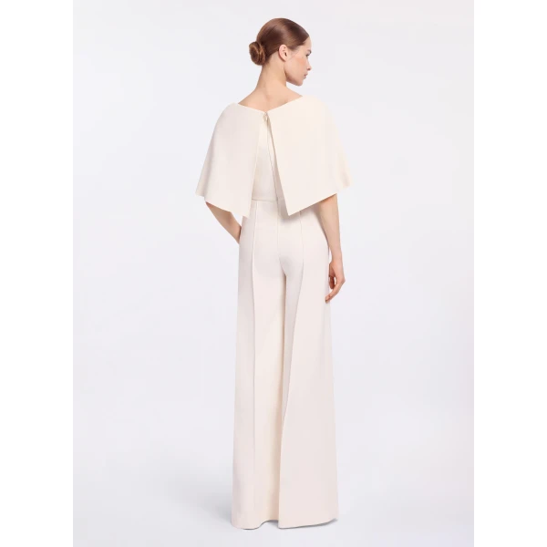Elie Saab Cady Jumpsuit in White featuring Cape Effect Sleeves – Luxury Designer Fashion at Coveti.