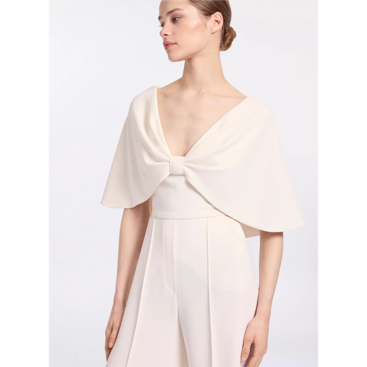 Elie Saab Cady Jumpsuit in White featuring Cape Effect Sleeves – Luxury Designer Fashion at Coveti.