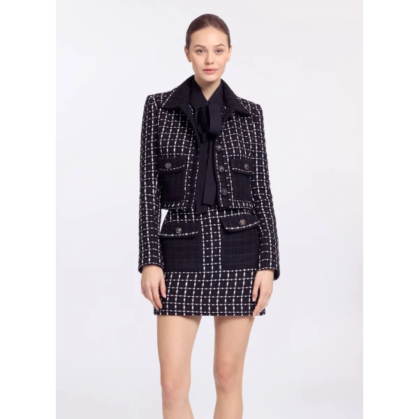 Elie Saab Tweed Short Skirt in White featuring Black & White Tweed – Luxury Designer Fashion at Coveti.