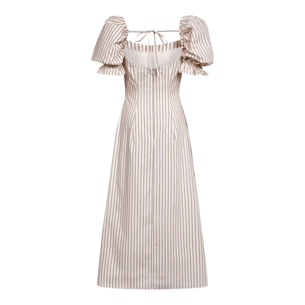 Markarian dresses with romantic neckline and structured silhouette