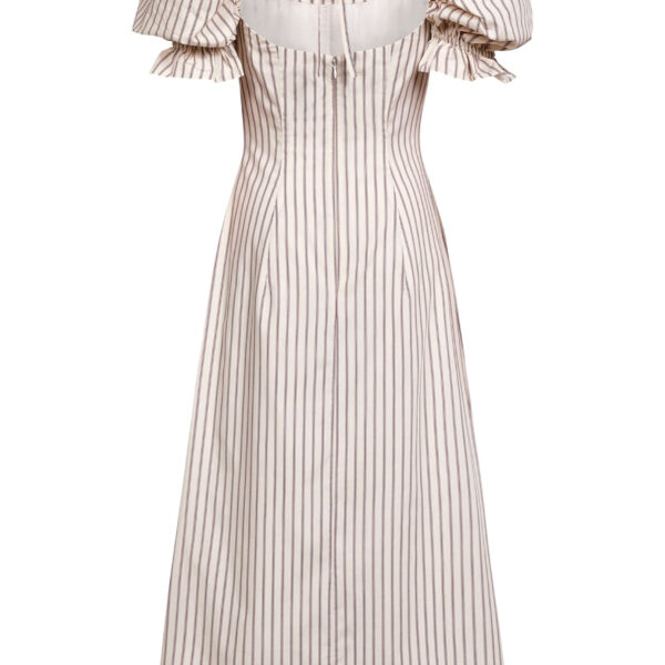 Markarian dresses with romantic neckline and structured silhouette
