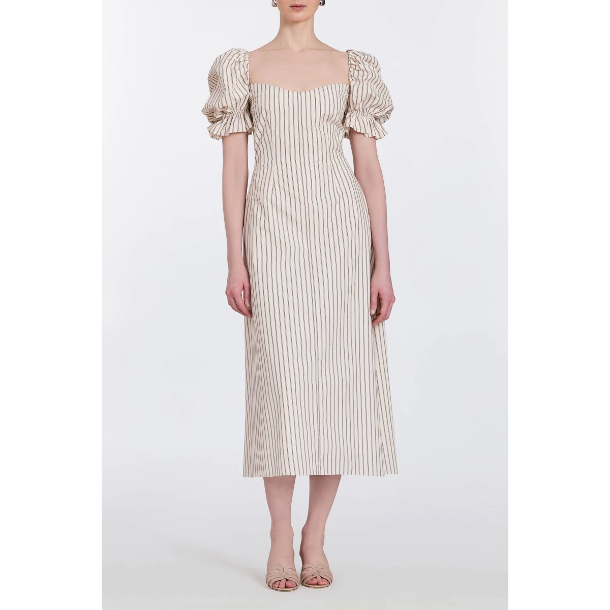 Markarian bridal with romantic neckline and structured silhouette