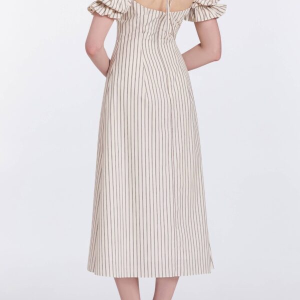 Markarian gowns with romantic neckline and structured silhouette