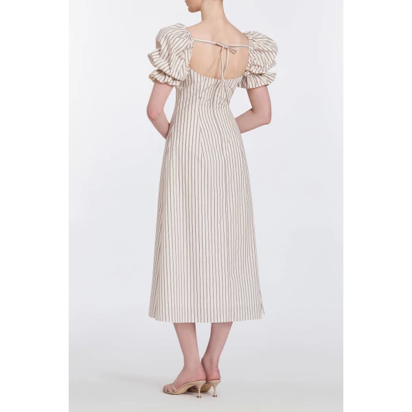 Markarian gowns with romantic neckline and structured silhouette