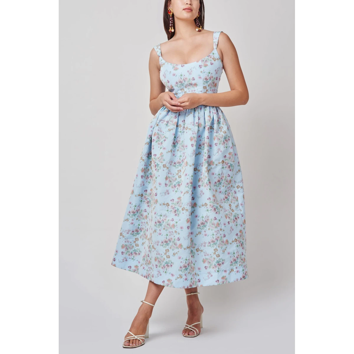 Markarian dresses with romantic neckline and structured silhouette