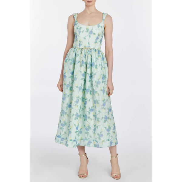 Markarian dresses with romantic neckline and structured silhouette