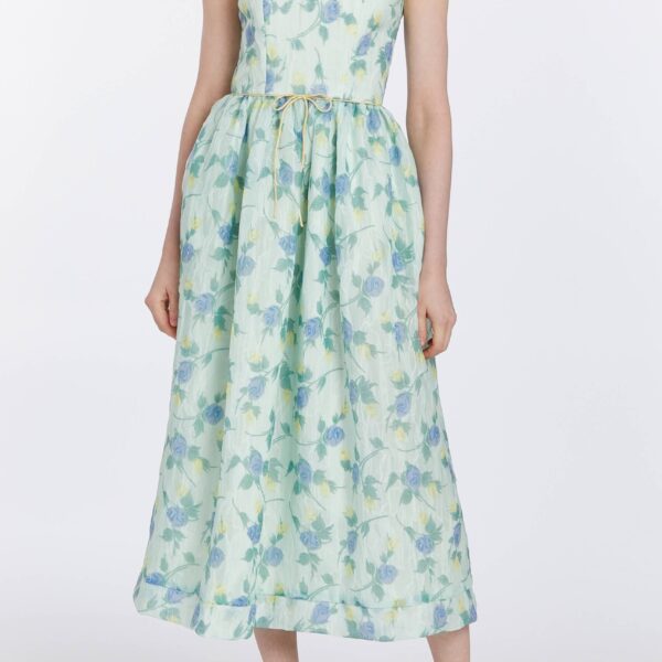 Markarian dresses with romantic neckline and structured silhouette