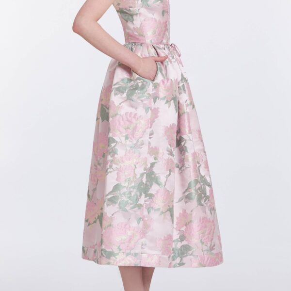 Markarian gowns with romantic neckline and structured silhouette