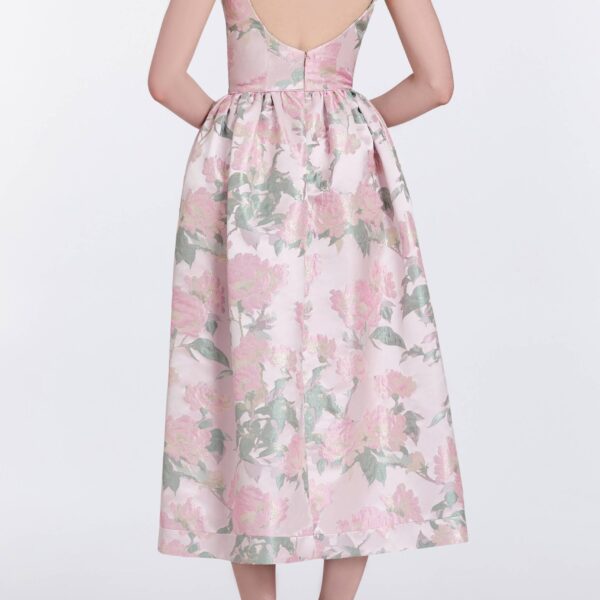 Markarian gowns with romantic neckline and structured silhouette