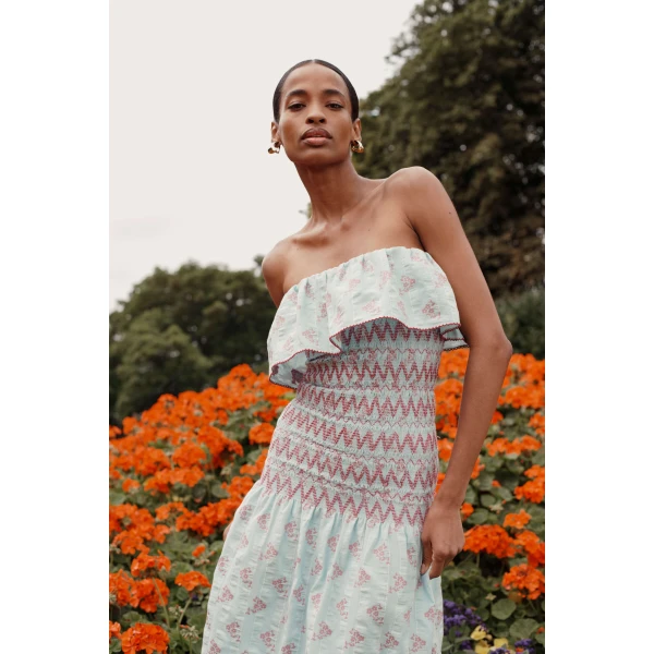Markarian dress with romantic neckline and structured silhouette