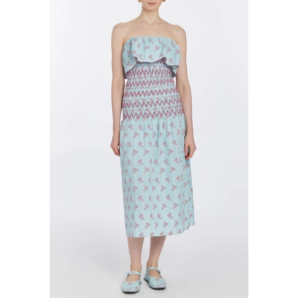 Markarian dresses with romantic neckline and structured silhouette